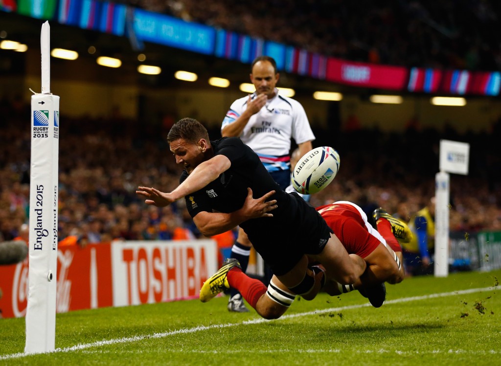 CARDIFF, WALES - OCTOBER 17: Tawera Kerr-Barlow of the New Zealand All Blacks is tackled short of the try line during the 2015 Rugby World Cup Quarter Final match between New Zealand and France at the Millennium Stadium on October 17, 2015 in Cardiff, United Kingdom. (Photo by Laurence Griffiths/Getty Images)