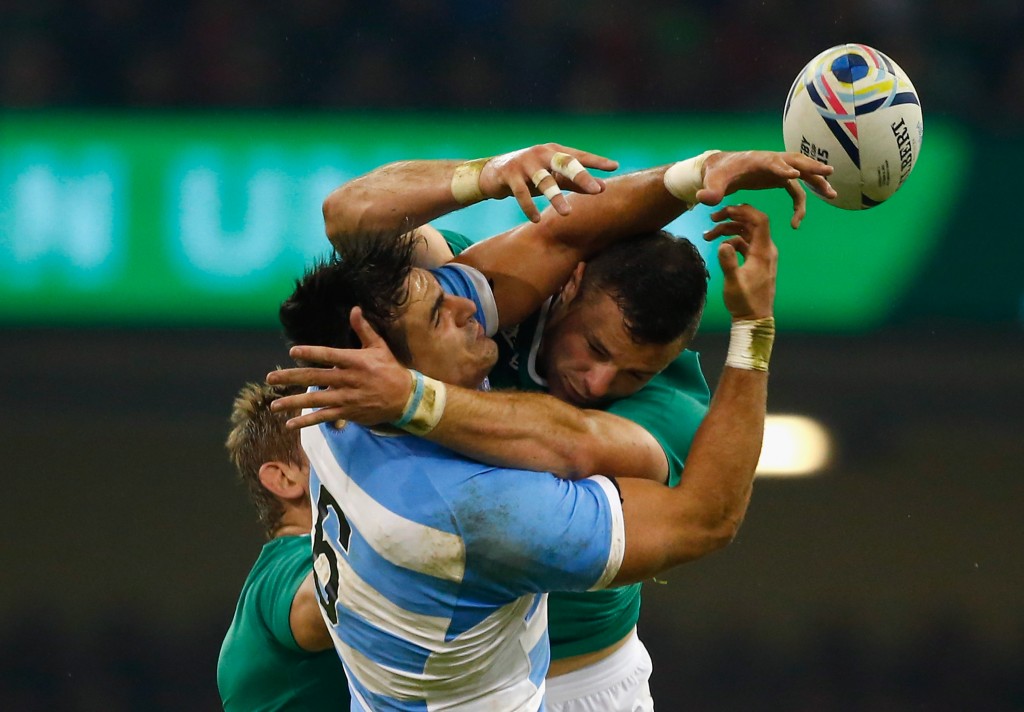 CARDIFF, WALES - OCTOBER 18: Robbie Henshaw of Ireland jumps for the ball with Pablo Matera of Argentina during the 2015 Rugby World Cup Quarter Final match between Ireland and Argentina at the Millennium Stadium on October 18, 2015 in Cardiff, United Kingdom. (Photo by Laurence Griffiths/Getty Images)