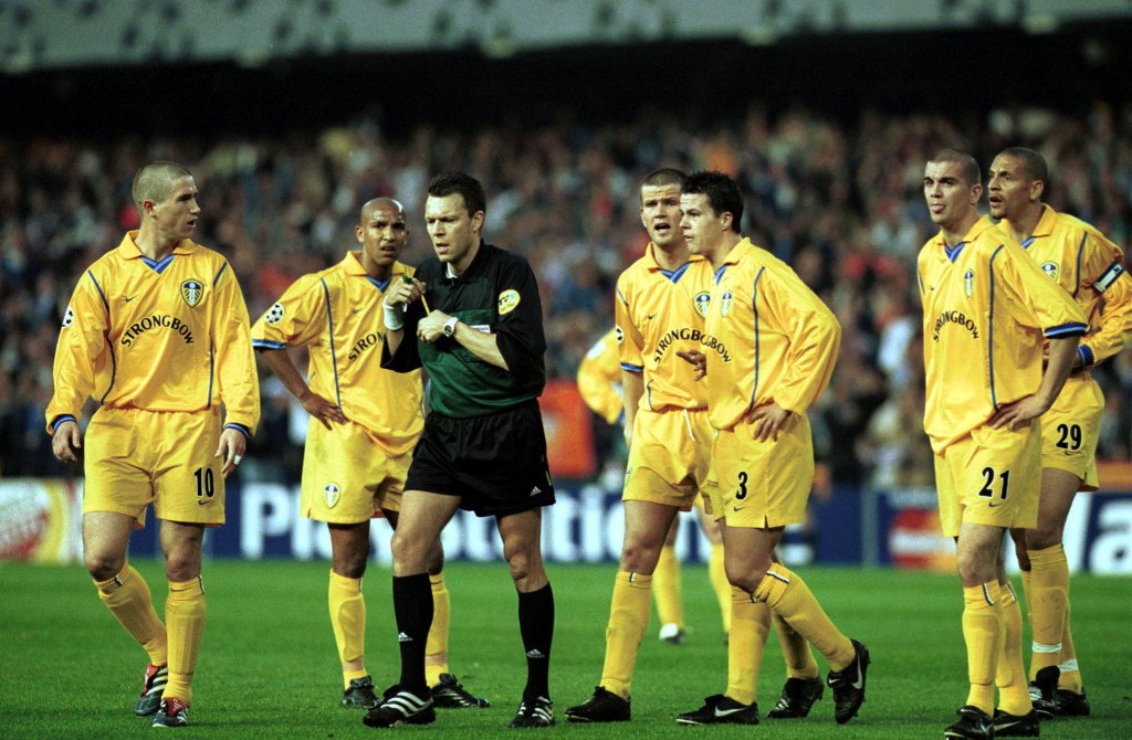 8 May 2001: The Leeds player surround the referee Urs Meier after Juan Sachez scored a controversial goal during the match between Valencia and Leeds United in the UEFA Champions League semi-final, second leg at Mestalla, Camp Del Valencia, Valencia, Spain. Mandatory Credit: Stu Forster/ALLSPORT