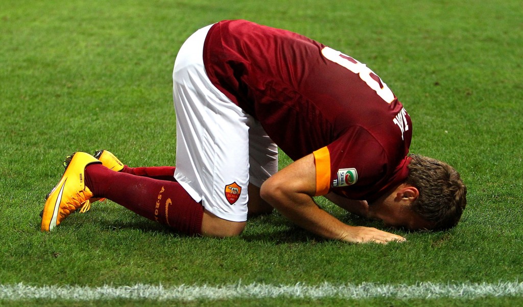 PARMA, ITALY - SEPTEMBER 24: Adem Ljajic of AS Roma celebrates after scoring the opening goal during the Serie A match between Parma FC and AS Roma at Stadio Ennio Tardini on September 24, 2014 in Parma, Italy. (Photo by Marco Luzzani/Getty Images)