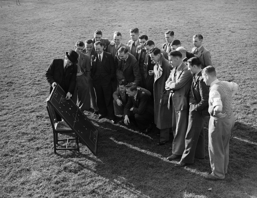 1938: Ipswich Town (Suffolk) football club players have a meeting to discuss tactics. (Photo by London Express/Getty Images)