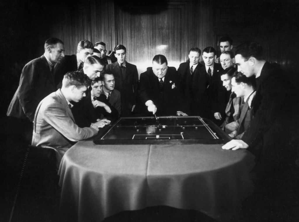 Arsenal football club manager George Allison rehearsing tactics with the team, November 1938. (Photo by H F Davis/Topical Press Agency/Getty Images)