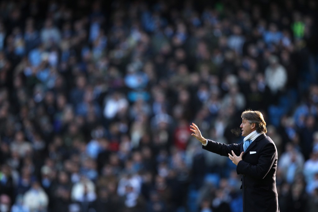 MANCHESTER, ENGLAND - JANUARY 31: Manchester City Manager Roberto Mancini gestures during the Barclays Premier League match between Manchester City and Portsmouth at the City of Manchester Stadium on January 31, 2010 in Manchester, England. (Photo by Richard Heathcote/Getty Images)