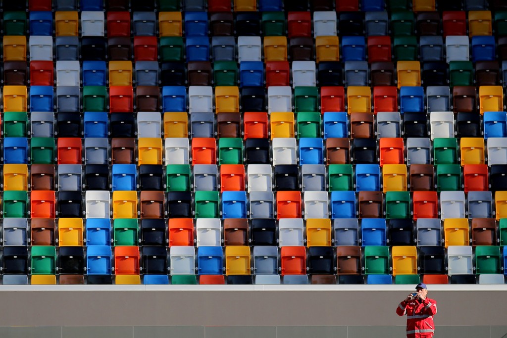 A man takes a picture before the Italian Serie A football match Udinese Vs Juventus on January 17, 2016 at 'Dacia Stadium' in Udine. / AFP / MARCO BERTORELLO (Photo credit should read MARCO BERTORELLO/AFP/Getty Images)