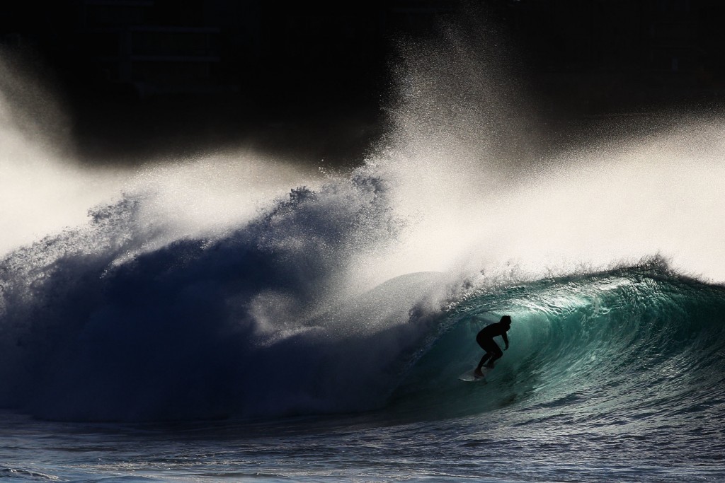 SYDNEY, AUSTRALIA - MAY 08: A surfer rides a wave while surfing at Bronte Beach on May 8, 2012 in Sydney, Australia. (Photo by Ryan Pierse/Getty Images)