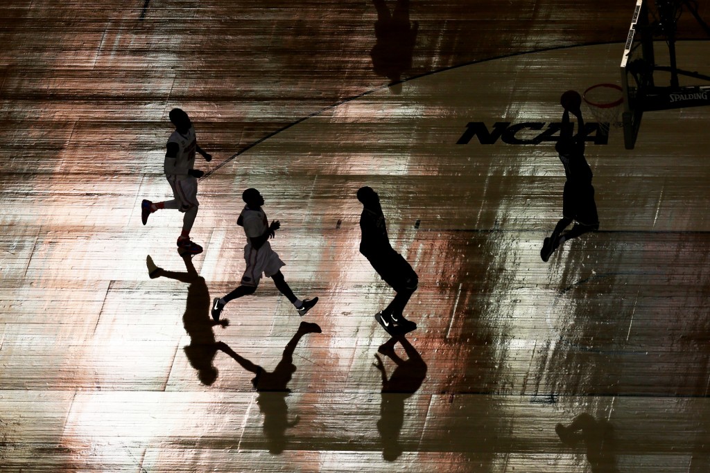 ARLINGTON, TX - APRIL 05: A view of game action during the NCAA Men's Final Four Semifinal between the Kentucky Wildcats and the Wisconsin Badgers at AT&T Stadium on April 5, 2014 in Arlington, Texas. (Photo by Ronald Martinez/Getty Images)