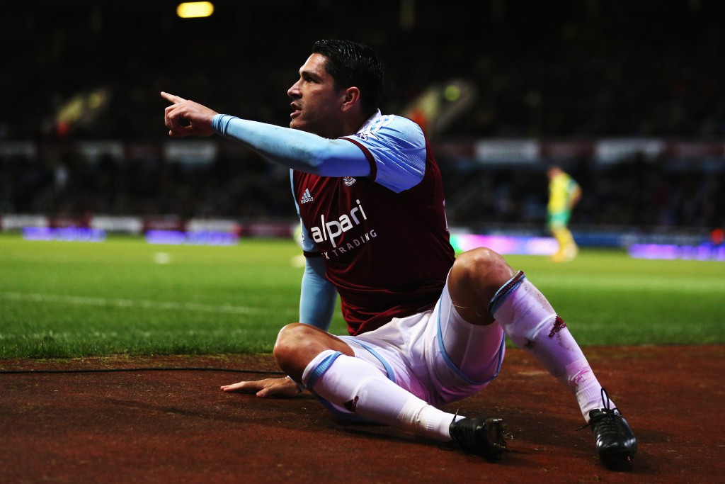 LONDON, ENGLAND - FEBRUARY 11: Marco Borriello of West Ham United falls off the pitch during the Barclays Premier League match between West Ham United and Norwich City at the Boleyn Ground on February 11, 2014 in London, England. (Photo by Ian Walton/Getty Images)