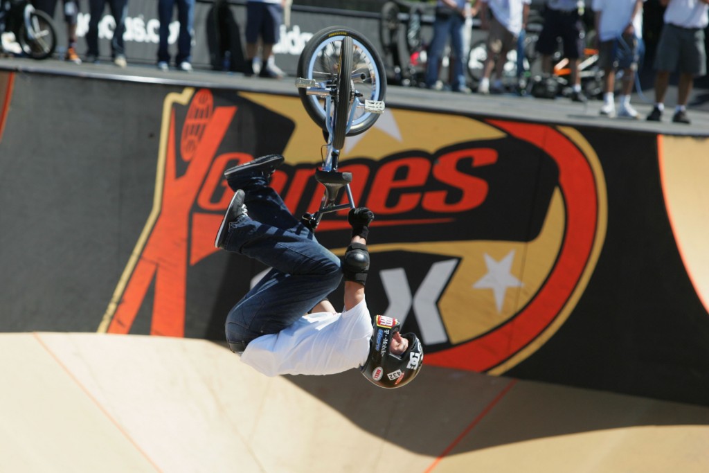 LOS ANGELES - AUGUST 7: Dave Mirra leaves his bike while in a 360 backflip in the Bike Stunt Park competition during the ESPN X-Games on August 7, 2004 at the Staples Center in Los Angeles, California. Mirra would finish first. (Photo by Harry How/Getty Images)