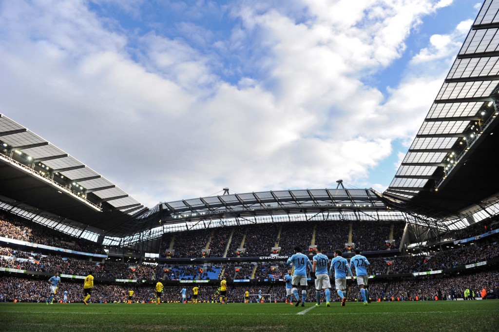 Manchester City's Argentinian striker Sergio Aguero (3R) celebrates scoring his team's third goal during the English Premier League football match between Manchester City and Aston Villa at the Etihad Stadium in Manchester, north west England, on March 5, 2016. Manchester City won the match 4-0. / AFP / Paul ELLIS / RESTRICTED TO EDITORIAL USE. No use with unauthorized audio, video, data, fixture lists, club/league logos or 'live' services. Online in-match use limited to 75 images, no video emulation. No use in betting, games or single club/league/player publications. / (Photo credit should read PAUL ELLIS/AFP/Getty Images)