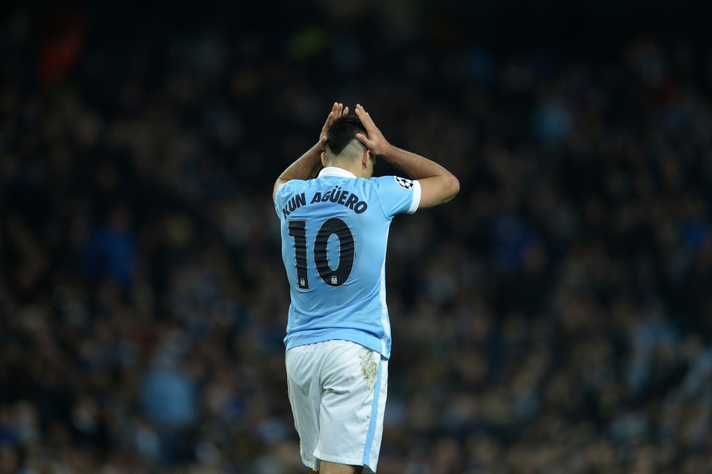 Manchester City's Argentinian striker Sergio Aguero reacts after Manchester City's Spanish midfielder David Silva (not pictured) failed to score from his pass during a UEFA Champions League last 16, second leg football match between Manchester City and Dynamo Kiev at the Etihad Stadium in Manchester, north west England, on March 15, 2016. / AFP / OLI SCARFF (Photo credit should read OLI SCARFF/AFP/Getty Images)