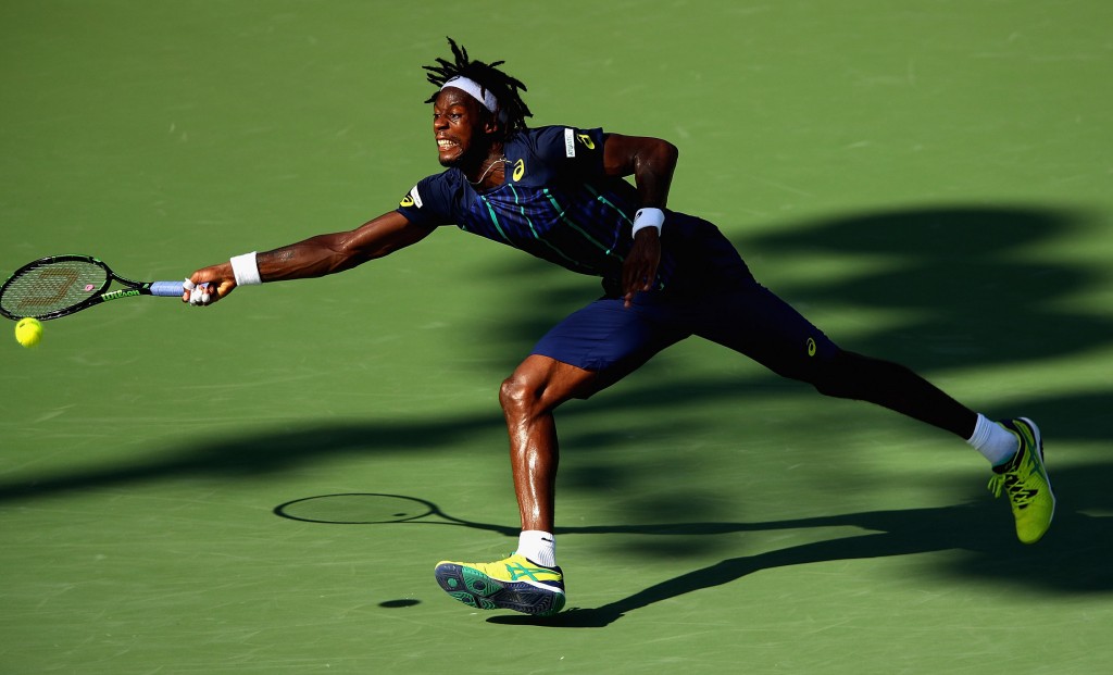 KEY BISCAYNE, FL - MARCH 31: Gael Monfils of France in action against Kei Nishikori of Japan in their quarter final match during the Miami Open Presented by Itau at Crandon Park Tennis Center on March 31, 2016 in Key Biscayne, Florida. (Photo by Clive Brunskill/Getty Images)