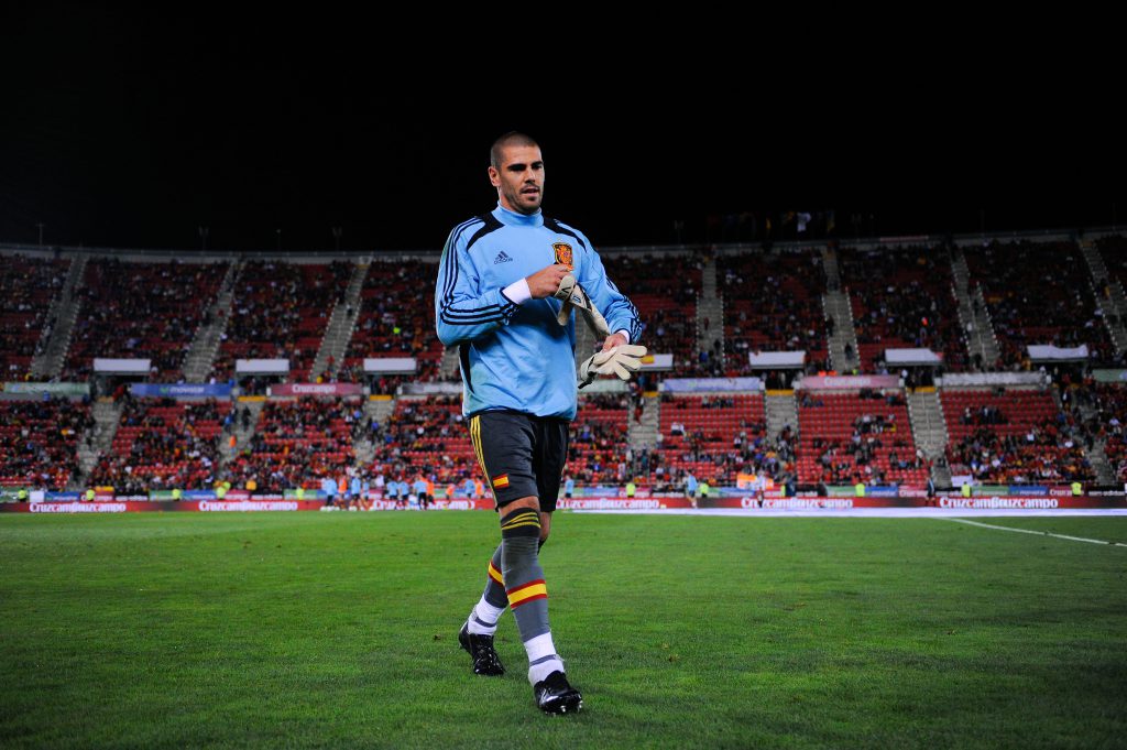 PALMA DE MALLORCA, SPAIN - OCTOBER 11: Victor Valdes of Spain leaves the pitch after the warm up prior to the FIFA 2014 World Cup Qualifier match between Spain and Belarus at Iberostars Stadium on October 11, 2013 in Palma de Mallorca, Spain. (Photo by David Ramos/Getty Images)