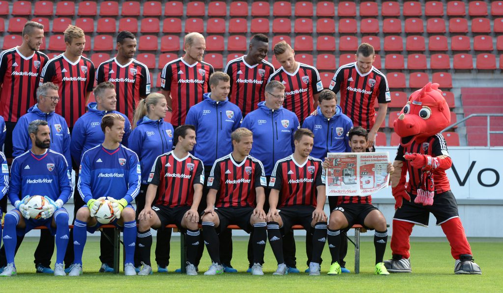 The German first division Bundesliga team of FC Ingolstadt 04 and their mascot "Schanzi" pose during the team presentation of the German first division Bundesliga team FC Ingolstadt 04 at the stadium in Ingolstadt, southern Germany, on July 9, 2015. AFP PHOTO / CHRISTOF STACHE (Photo credit should read CHRISTOF STACHE/AFP/Getty Images)