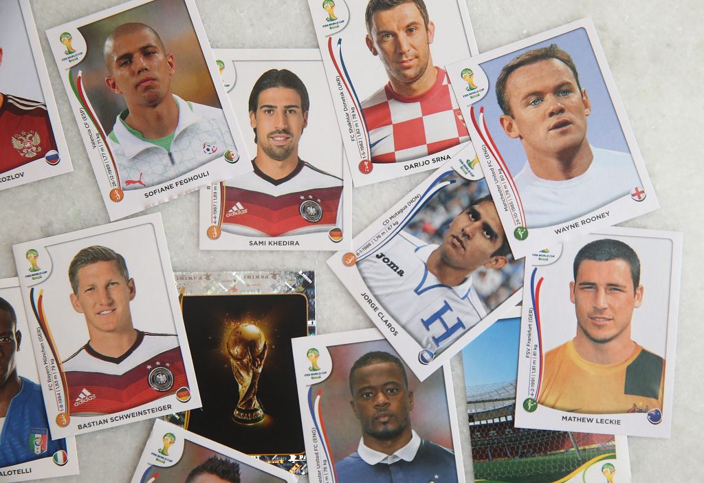 RIO DE JANEIRO, BRAZIL - MAY 28: Panini World Cup stickers are displayed on May 28, 2014 in Rio de Janeiro, Brazil. Fans of World Cup Soccer are flocking to buy the stickers which are placed in an album where the fans of World Cup Soccer try to fill their books with all 640 stickers, which include each player for the 32 nations in the tournament plus a team picture, logo and photos of the stadiums. The 2014 FIFA World Cup begins June 12 in Brazil. (Photo Illustration by Mario Tama/Getty Images)