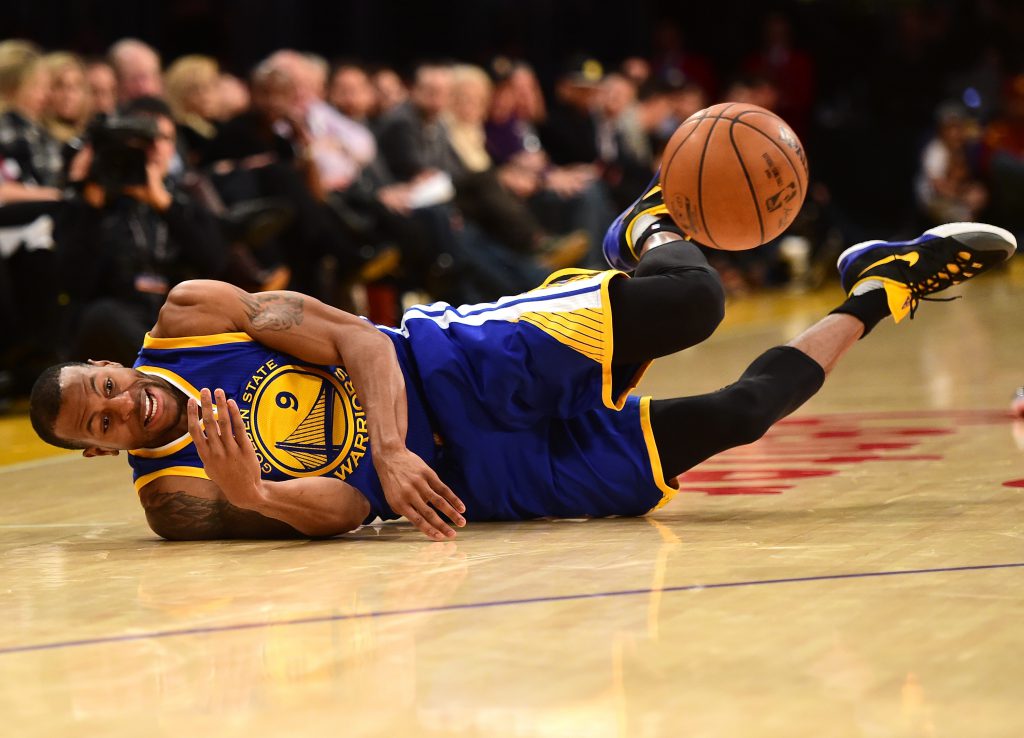 LOS ANGELES, CA - JANUARY 05: Andre Iguodala #9 of the Golden State Warriors dives for possession of the ball during a 109-88 win over the Los Angeles Lakers at Staples Center on January 5, 2016 in Los Angeles, California. NOTE TO USER: User expressly acknowledges and agrees that, by downloading and or using this Photograph, user is consenting to the terms and condition of the Getty Images License Agreement. (Photo by Harry How/Getty Images)