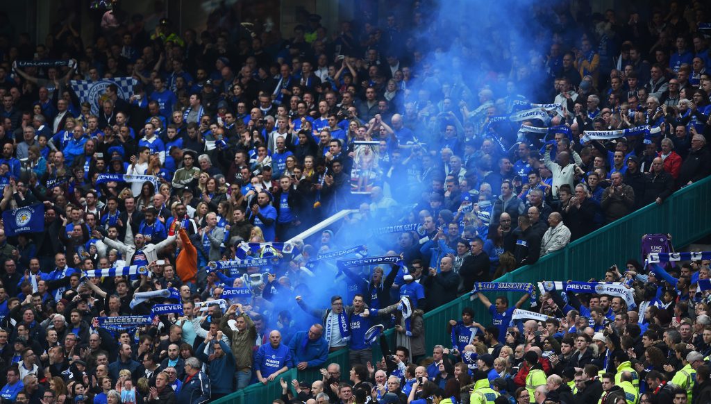 MANCHESTER, UNITED KINGDOM - MAY 01: A flare is let off by Leicester fans during the Barclays Premier League match between Manchester United and Leicester City at Old Trafford on May 1, 2016 in Manchester, England. (Photo by Laurence Griffiths/Getty Images)