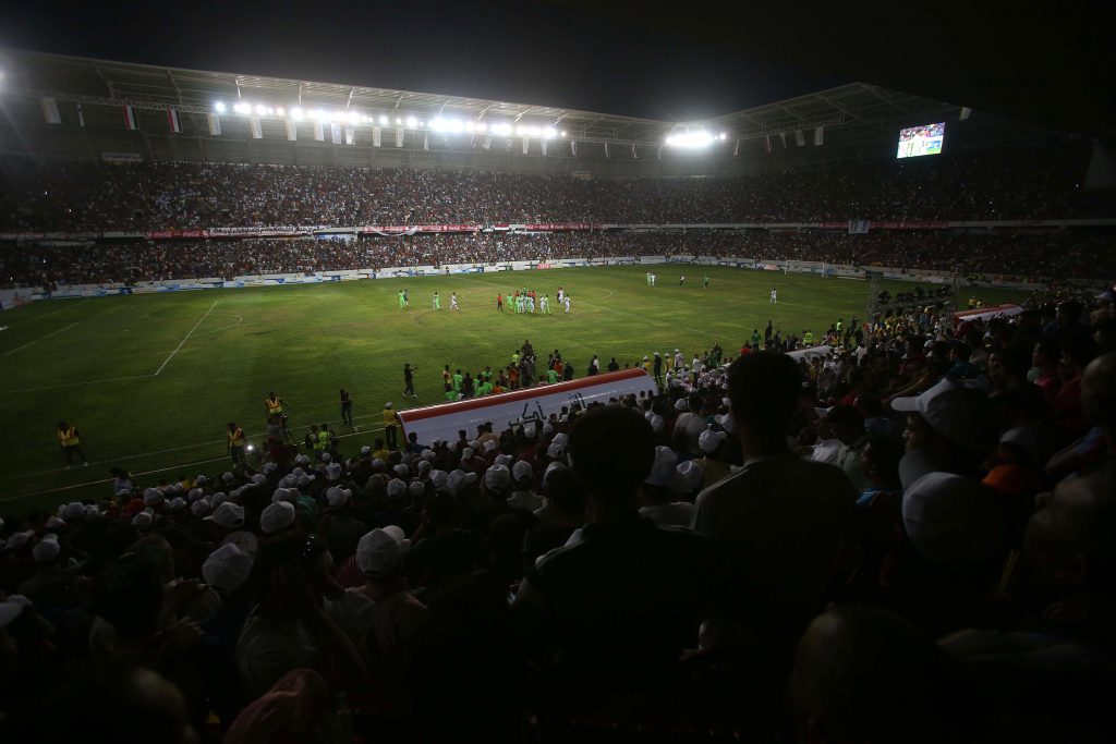 Iraqis attend a football match between the Iraqi national team and the Karbala club to celebrate the opening of the new Karbala International Stadium on May 12, 2016 in the holy Shiite city of Karbala. / AFP / Mohammed SAWAF (Photo credit should read MOHAMMED SAWAF/AFP/Getty Images)