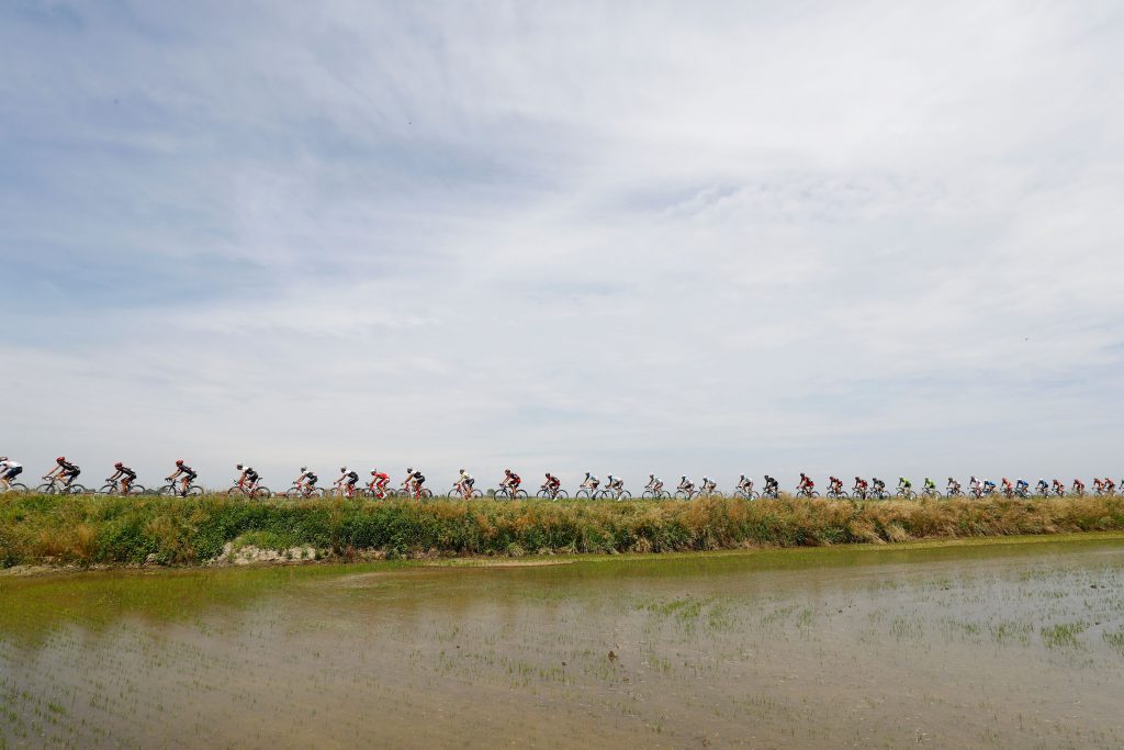 TOPSHOT - The peloton rides during the 18th stage of the 99th Giro d'Italia, Tour of Italy, from Muggio to Pinerolo on May 26, 2016. AFP PHOTO / LUK BENIES / AFP / LUK BENIES (Photo credit should read LUK BENIES/AFP/Getty Images)