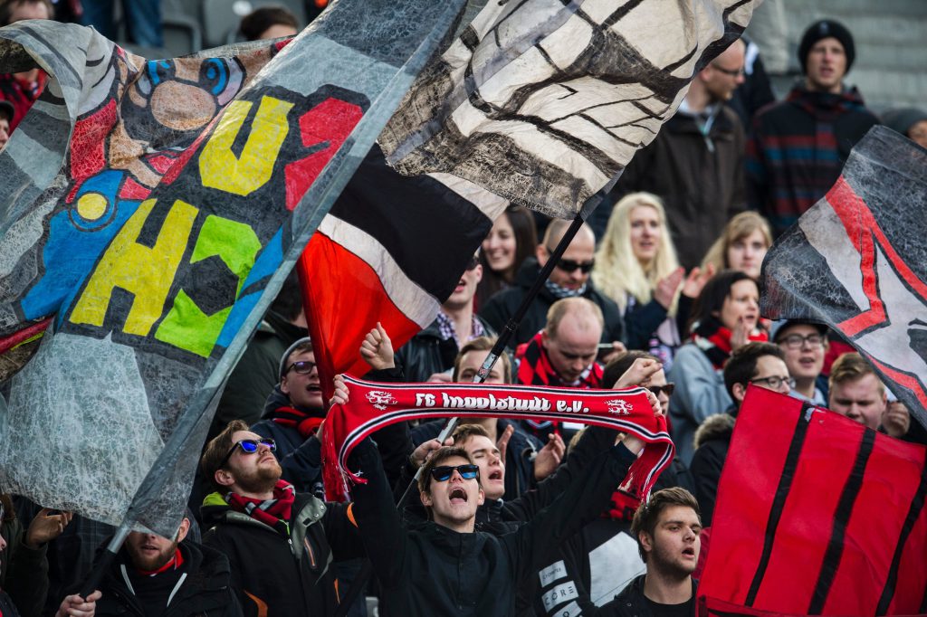 Ingolstadt fans are seen during the German Bundesliga first division football match between Hertha BSC vs FC Ingolstadt 04 in Berlin, Germany, on March 19, 2016. / AFP / ODD ANDERSEN / RESTRICTIONS: DURING MATCH TIME: DFL RULES TO LIMIT THE ONLINE USAGE TO 15 PICTURES PER MATCH AND FORBID IMAGE SEQUENCES TO SIMULATE VIDEO. == RESTRICTED TO EDITORIAL USE == FOR FURTHER QUERIES PLEASE CONTACT DFL DIRECTLY AT + 49 69 650050 (Photo credit should read ODD ANDERSEN/AFP/Getty Images)