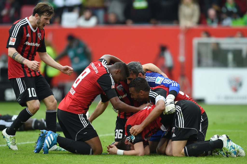 Several Ingolstadt players celebrate during the German Bundesliga first division football match between FC Ingolstadt 04 and Borussia Moenchengladbach in Ingolstadt, Germany , on April 9, 2016. / AFP / CHRISTOF STACHE / RESTRICTIONS: DURING MATCH TIME: DFL RULES TO LIMIT THE ONLINE USAGE TO 15 PICTURES PER MATCH AND FORBID IMAGE SEQUENCES TO SIMULATE VIDEO. == RESTRICTED TO EDITORIAL USE == FOR FURTHER QUERIES PLEASE CONTACT DFL DIRECTLY AT + 49 69 650050 (Photo credit should read CHRISTOF STACHE/AFP/Getty Images)