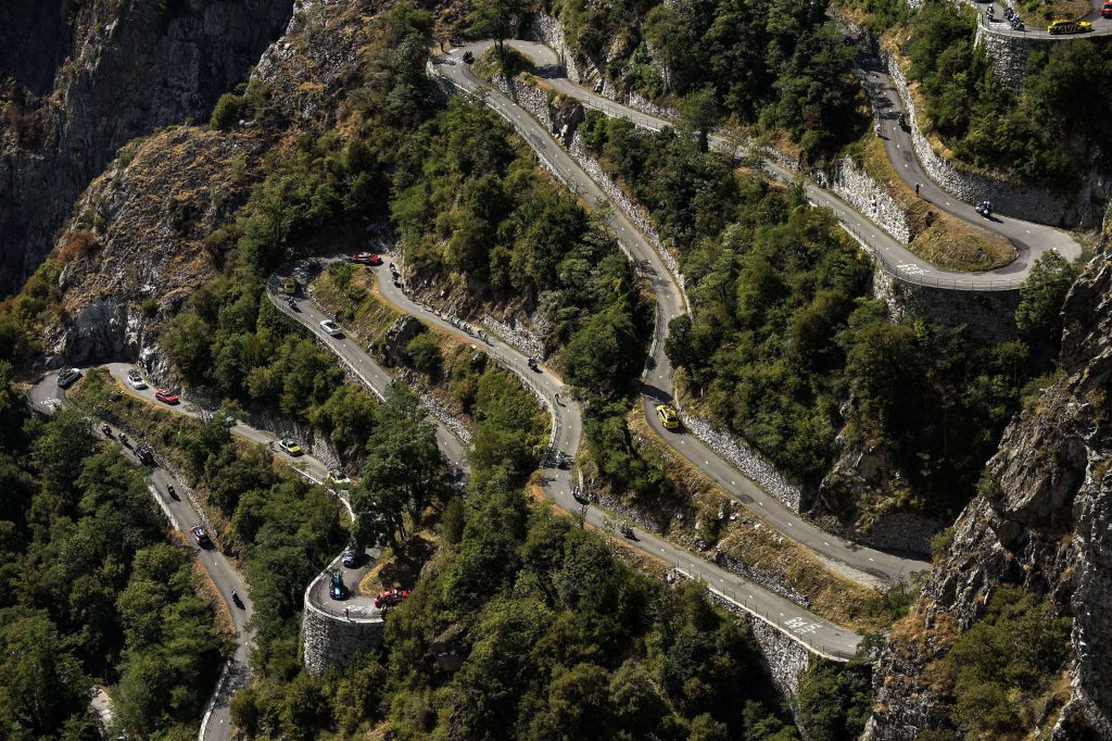 Cyclists climb the Lacets de Montvernier during the 186,5 km eighteenth stage of the 102nd edition of the Tour de France cycling race on July 23, 2015, between Gap and Saint-Jean-de-Maurienne, French Alps. AFP PHOTO / ERIC FEFERBERG (Photo credit should read ERIC FEFERBERG/AFP/Getty Images)