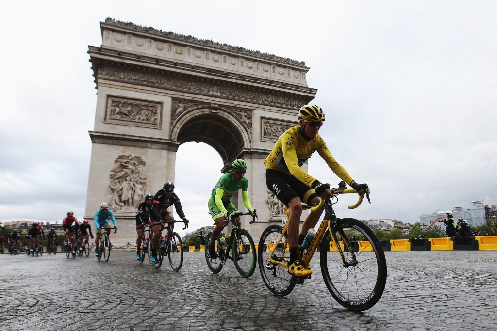 PARIS, FRANCE - JULY 26: Chris Froome (yellow jersey) of Great Britain and Team Sky rides past the Arc de Triomphe on his way to overall victory during the twenty first stage of the 2015 Tour de France, a 109.5 km stage between Sevres and Paris Champs-Elysees, on July 26, 2015 in Paris, France. (Photo by Doug Pensinger/Getty Images)