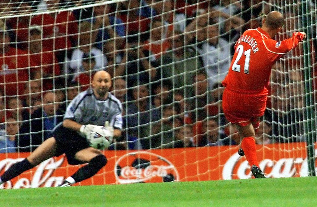 CARDIFF, UNITED KINGDOM: Liverpool's Gary McAllister sends Manchester United's French goalkeeper Fabien Barthez the wrong way to score the first goal 12 August 2001, during their FA Charity Shield match at the Millennium Stadium in Cardiff. The Charity Shield is contested by the Premiership Champions (Manchester United) and the FA Cup winners (Liverpool). The Premiership starts next week on 18 August 2001. AFP PHOTO/Gerry PENNY (Photo credit should read GERRY PENNY/AFP/Getty Images)