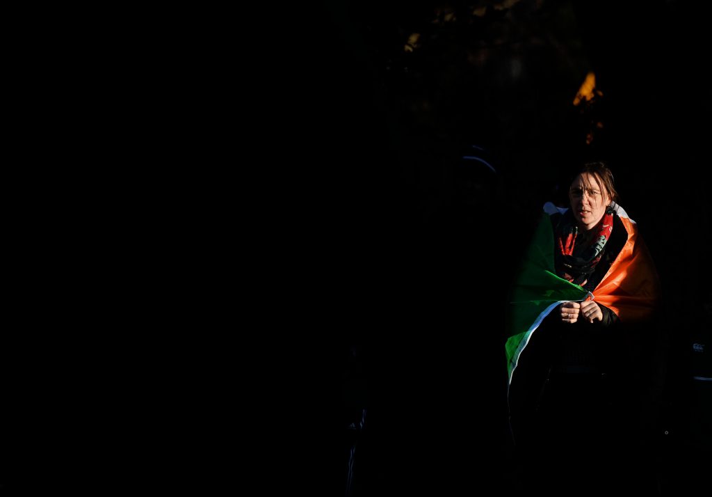 DUBLIN, IRELAND - MARCH 29: A Republic of Ireland fan makes her way to the ground through the evening sunshine before the international friendly match between the Republic of Ireland and Slovakia at Aviva Stadium on March 29, 2016 in Dublin, Ireland. (Photo by Charles McQuillan/Getty Images)