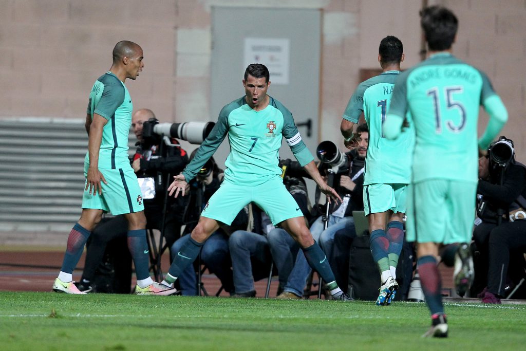 LEIRIA, PORTUGAL - MARCH 29: Portuguese's forward Cristiano Ronaldo celebrates scoring Portugal's second goal during the match between Portugal and BelgiumFriendly International at Estadio Municipal de Leiria on March 29, 2016 in Lisbon, Portugal. (Photo by Carlos Rodrigues/Getty Images)