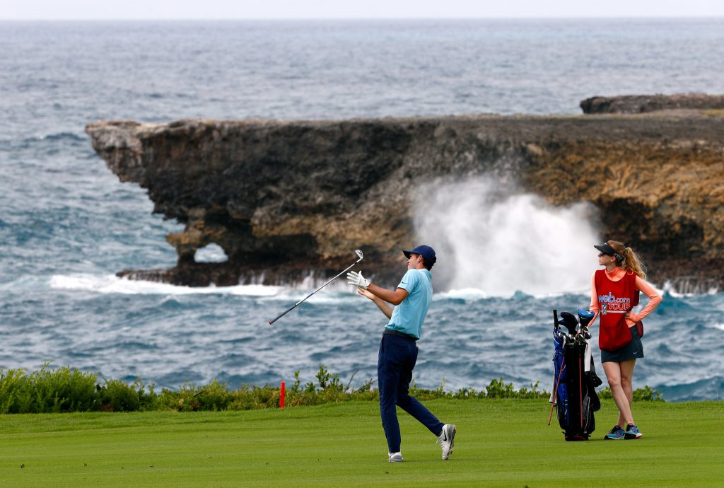 PUNTA CANA, DOMINICAN REPUBLIC - JUNE 02: Michael Hebert flips his club after hitting his second shot on the 18th hole during the first round of the Corales Puntacana Resort And Club Championship on June 2, 2016 in Punta Cana, Dominican Republic. (Photo by Jamie Squire/Getty Images)