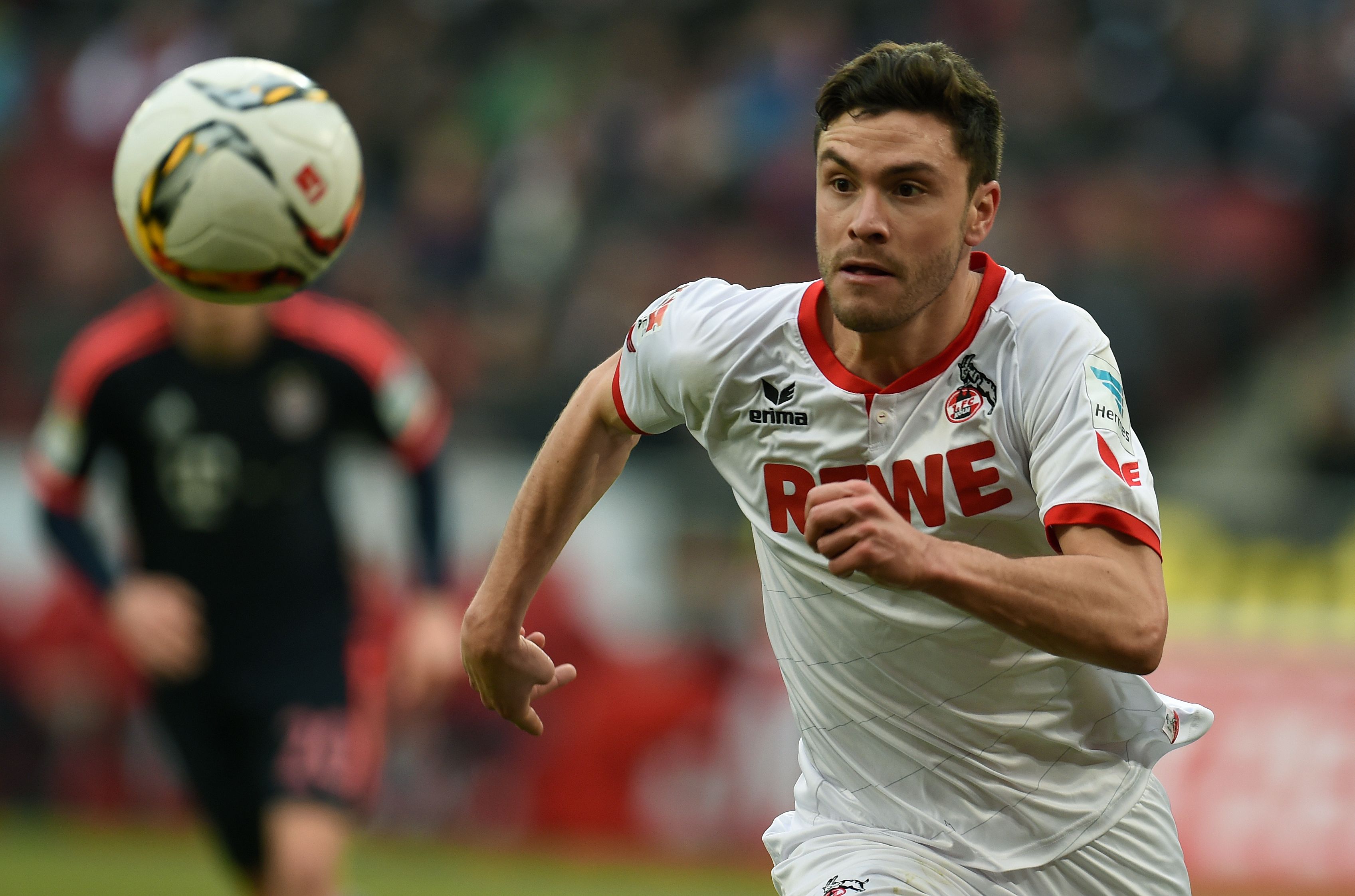 Cologne's defender Jonas Hector runs with the ball during the German Bundesliga first division football match between FC Cologne vs FC Bayern Munich in Cologne, western Germany, on March 19, 2016. / AFP / PATRIK STOLLARZ / RESTRICTIONS: DURING MATCH TIME: DFL RULES TO LIMIT THE ONLINE USAGE TO 15 PICTURES PER MATCH AND FORBID IMAGE SEQUENCES TO SIMULATE VIDEO. == RESTRICTED TO EDITORIAL USE == FOR FURTHER QUERIES PLEASE CONTACT DFL DIRECTLY AT + 49 69 650050 (Photo credit should read PATRIK STOLLARZ/AFP/Getty Images)