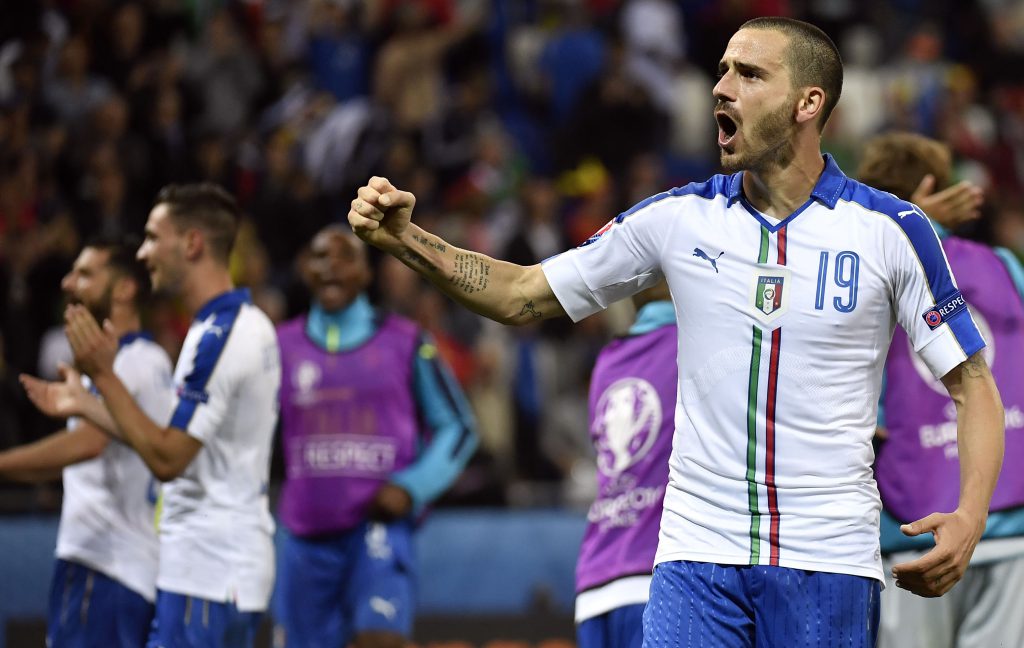 Italy's defender Leonardo Bonucci celebrates his team's 2-0 victory following the Euro 2016 group E football match between Belgium and Italy at the Parc Olympique Lyonnais stadium in Lyon on June 13, 2016. / AFP / jeff pachoud (Photo credit should read JEFF PACHOUD/AFP/Getty Images)