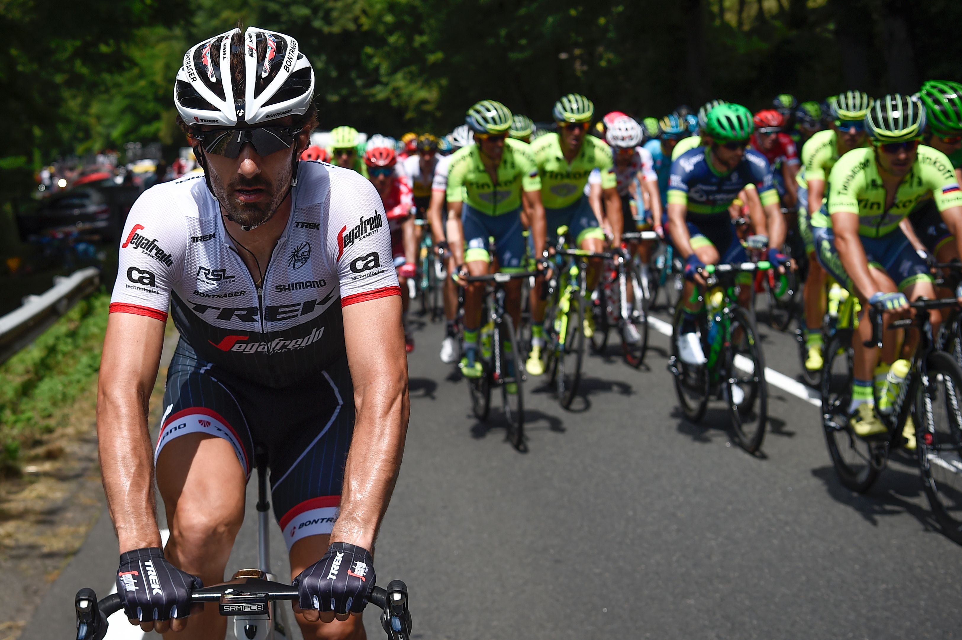 Switzerland's Fabian Cancellara (L) rides during the 190,5 km sixth stage of the 103rd edition of the Tour de France cycling race on July 7, 2016 between Arpajon-sur-Cere and Montauban. / AFP / LIONEL BONAVENTURE (Photo credit should read LIONEL BONAVENTURE/AFP/Getty Images)