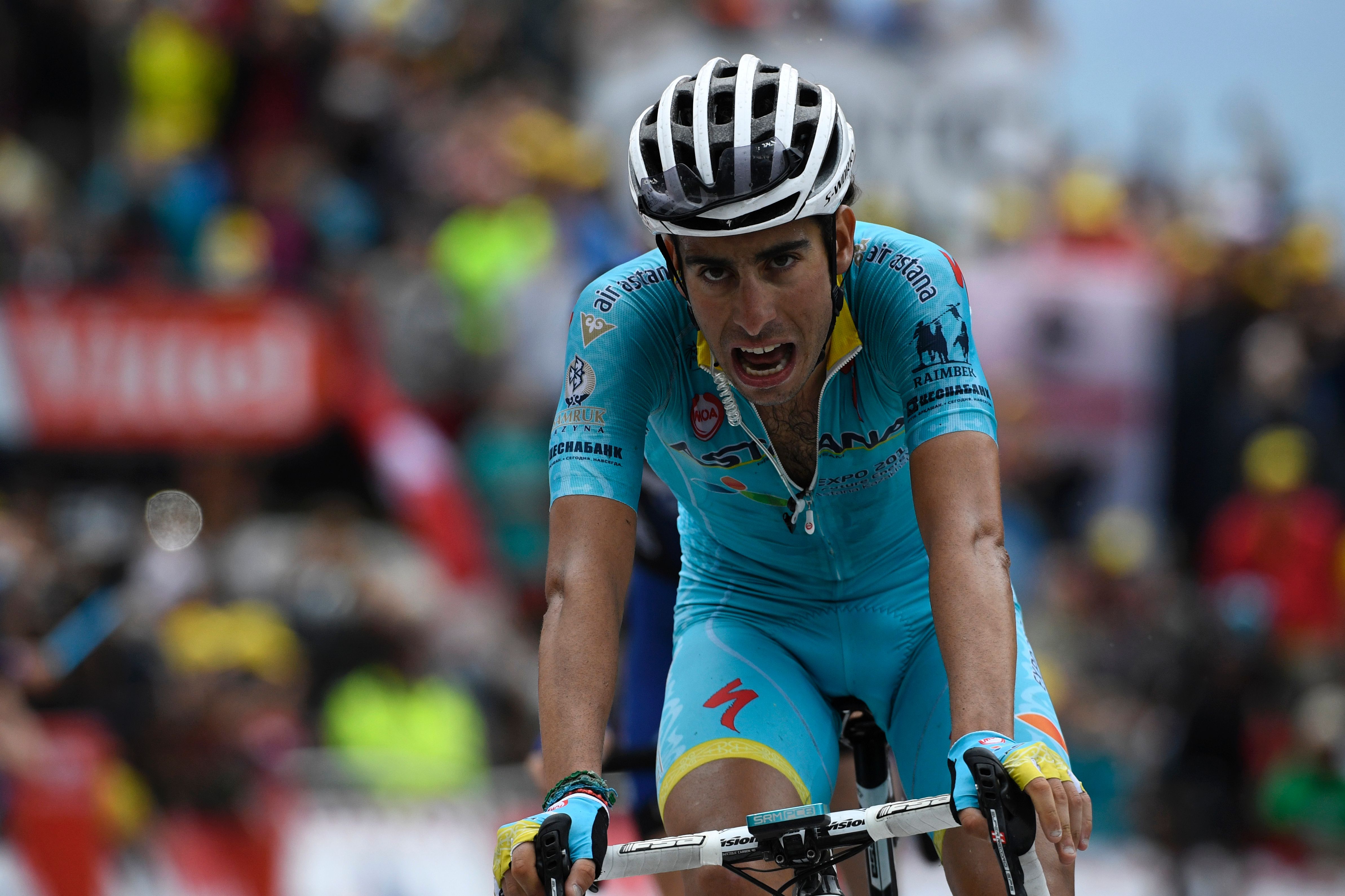 Italy's Fabio Aru crosses the finish line at the end of the 146 km nineteenth stage of the 103rd edition of the Tour de France cycling race on July 22, 2016 between Albertville and Saint-Gervais Mont Blanc, French Alps. / AFP / LIONEL BONAVENTURE (Photo credit should read LIONEL BONAVENTURE/AFP/Getty Images)