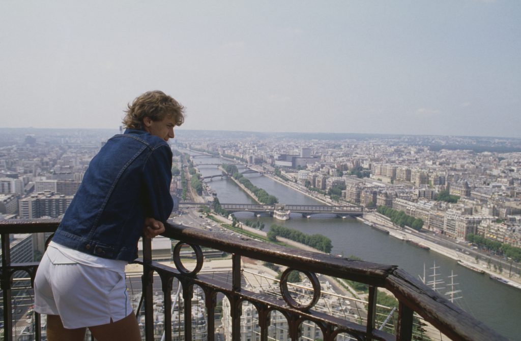 Mats Wilander of Sweden the poses for a portrait at the Eiffel Tower after winning the Men's Singles Final match at the French Open Tennis Championship on 7 June 1982 at the Stade Roland Garros Stadium in Paris, France. (Photo by Steve Powell/Getty Images)