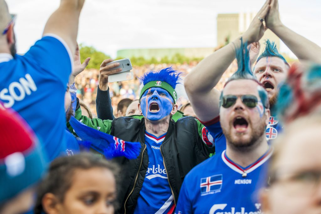 Iceland's fans react during the public screening of the quater final EURO 2016 football match against France, in Reykjavik, Iceland, on July 3, 2016. The quarter final match played in Saint-Denis, near Paris. / AFP / Karl Petersson (Photo credit should read KARL PETERSSON/AFP/Getty Images)