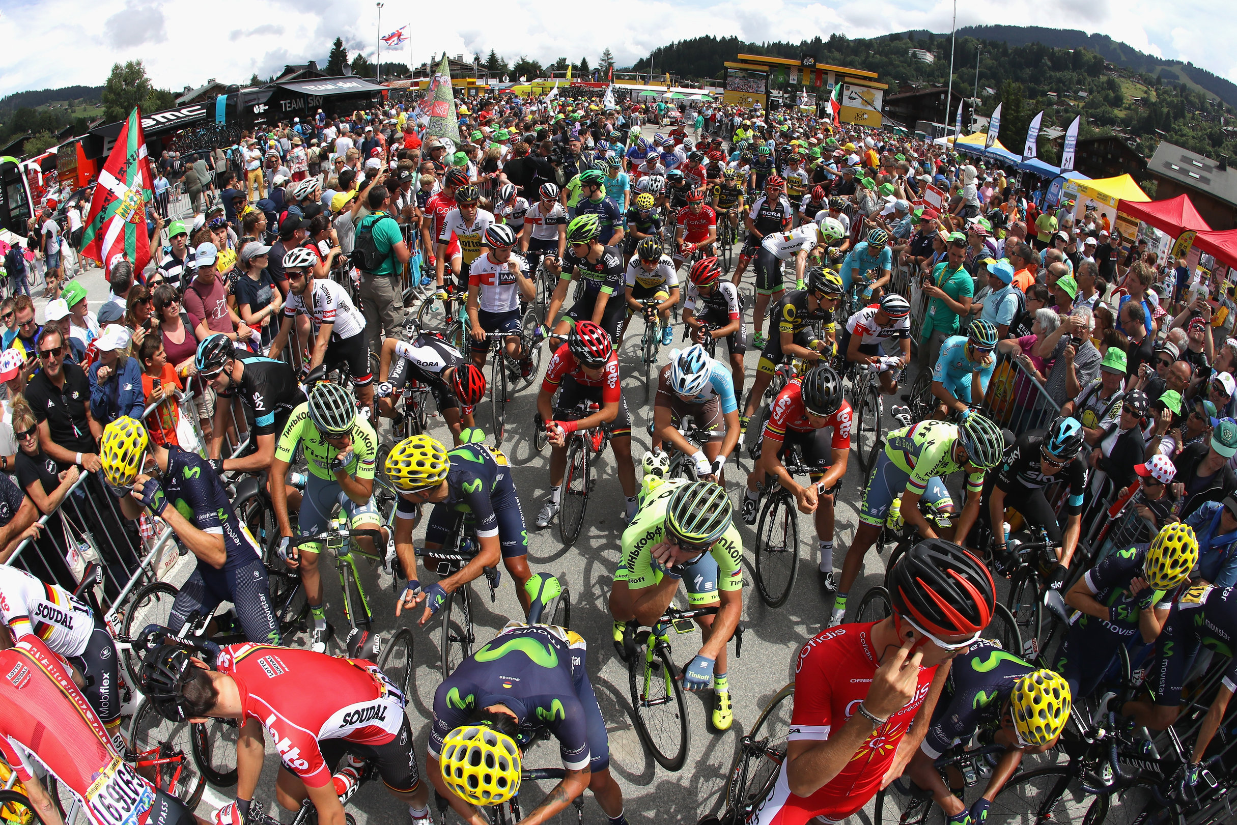 MEGEVE, FRANCE - JULY 23: Supporters look on as riders prepare to start stage twenty of the 2016 Le Tour de France, from Megeve to Morzine on July 23, 2016 in Megeve, France. (Photo by Chris Graythen/Getty Images)