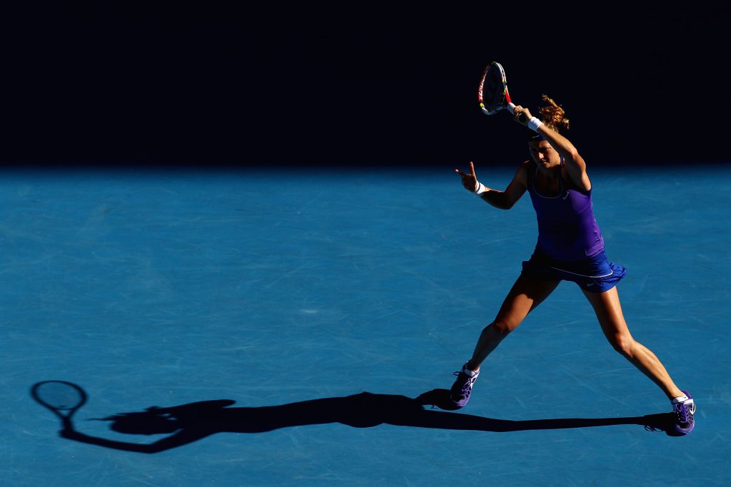 MELBOURNE, AUSTRALIA - JANUARY 26: Petra Kvitova of the Czech Republic plays a forehand in her semifinal match against Maria Sharapova of Russia during day eleven of the 2012 Australian Open at Melbourne Park on January 26, 2012 in Melbourne, Australia. (Photo by Ryan Pierse/Getty Images)