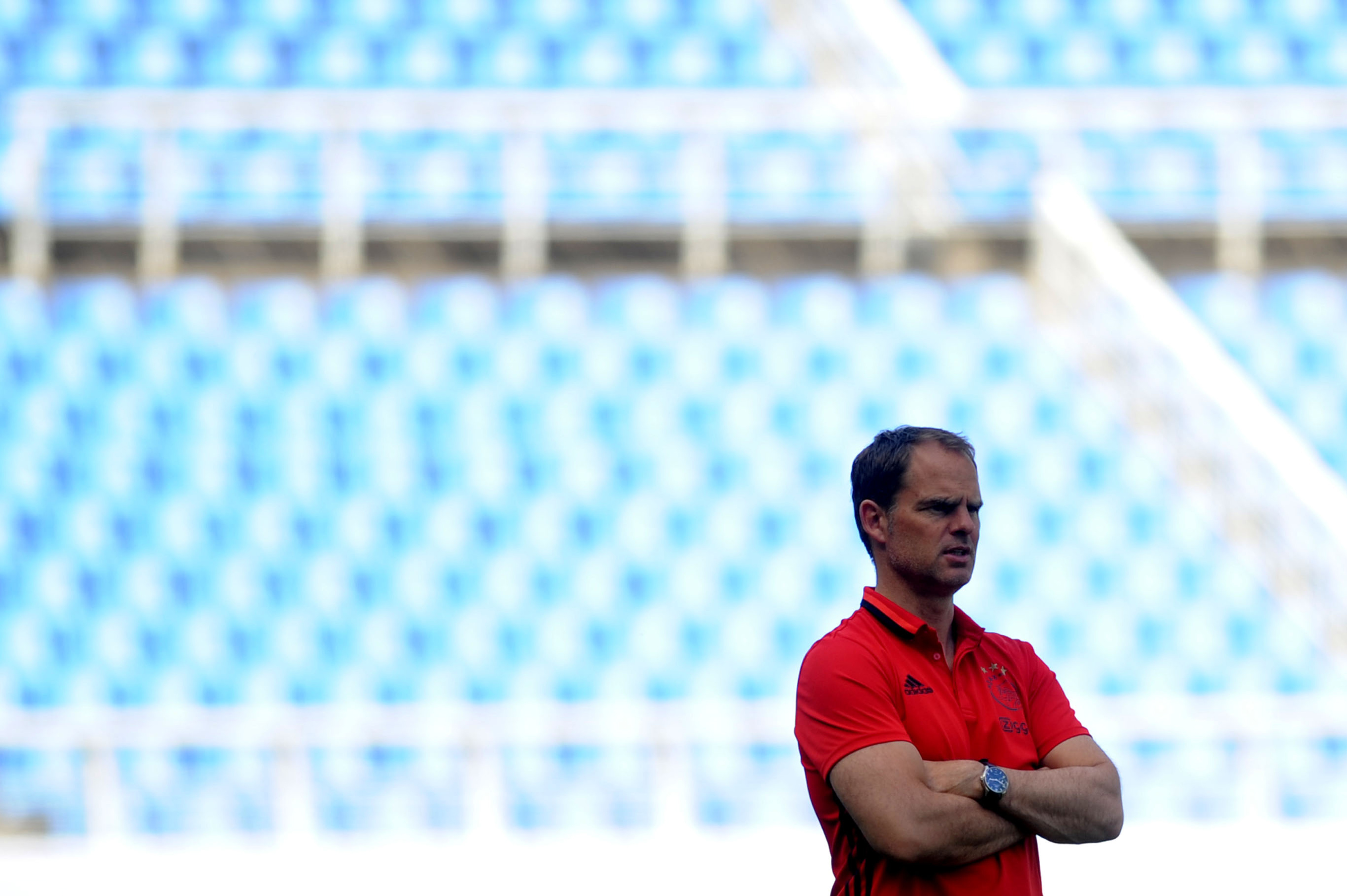 Ajax Amsterdam football club's coach Frank de Boer reacts during a training session in Shenyang, northeast China's Liaoning province on May 17, 2016. Ajax will play a friendly match against Chinese Super League club Liaoning Whowin FC on May 18 at Shenyang Olympic Sports Center as part of their China tour. / AFP / STR / China OUT (Photo credit should read STR/AFP/Getty Images)