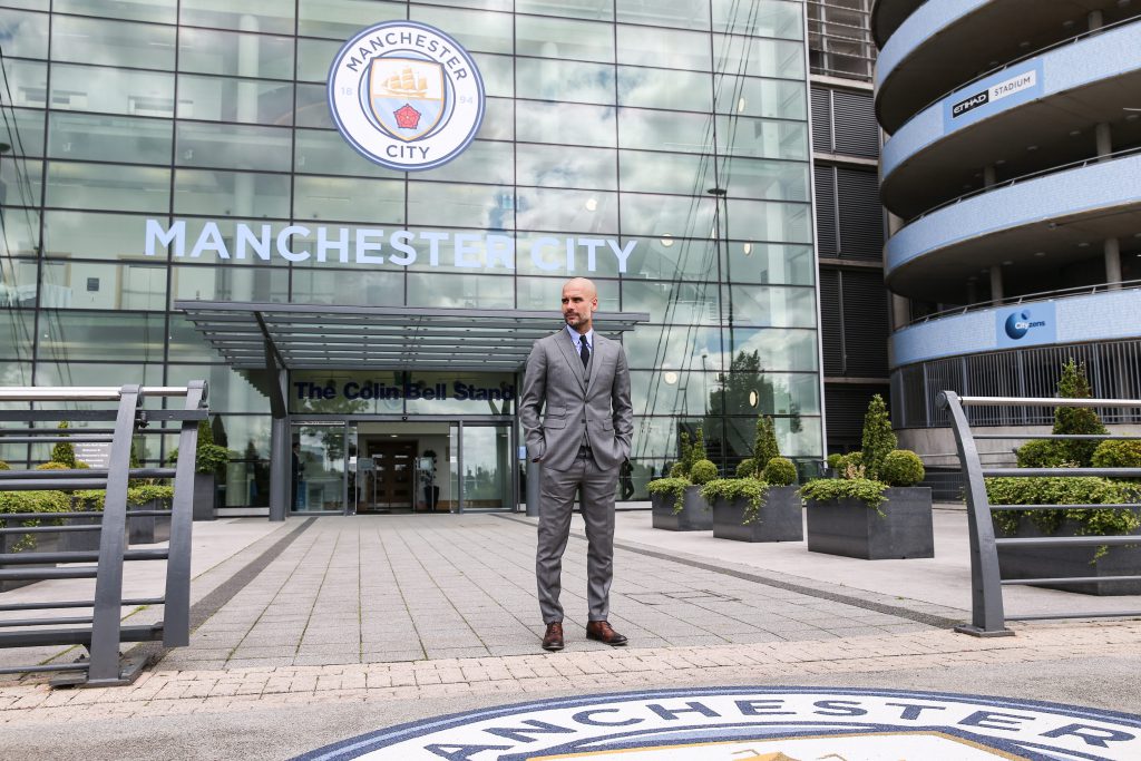 MANCHESTER, ENGLAND - JULY 08: Manchester City's manager Pep Guardiola poses for photographs outside the Etihad Stadium on July 8, 2016 in Manchester, England. (Photo by Barrington Coombs/Getty Images)