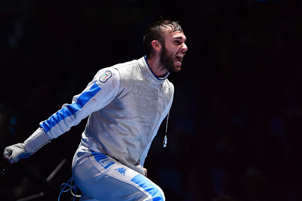 Italy's Daniele Garozzo (R) celebrates celebrates winning against as US Alexander Massialas in the mens individual foil gold medal bout as part of the fencing event of the Rio 2016 Olympic Games, on August 7, 2016, at the Carioca Arena 3, in Rio de Janeiro. / AFP / Fabrice COFFRINI (Photo credit should read FABRICE COFFRINI/AFP/Getty Images)