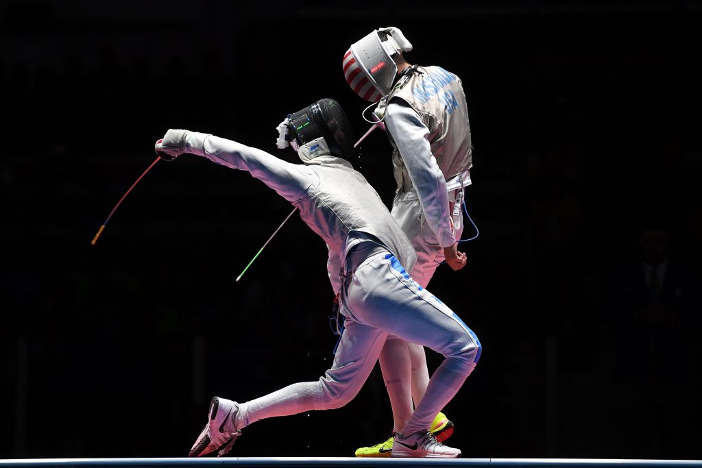 TOPSHOT - US Alexander Massialas (R) competes against Italy's Daniele Garozzo during the mens individual foil gold medal bout as part of the fencing event of the Rio 2016 Olympic Games, on August 7, 2016, at the Carioca Arena 3, in Rio de Janeiro. / AFP / Kirill KUDRYAVTSEV (Photo credit should read KIRILL KUDRYAVTSEV/AFP/Getty Images)