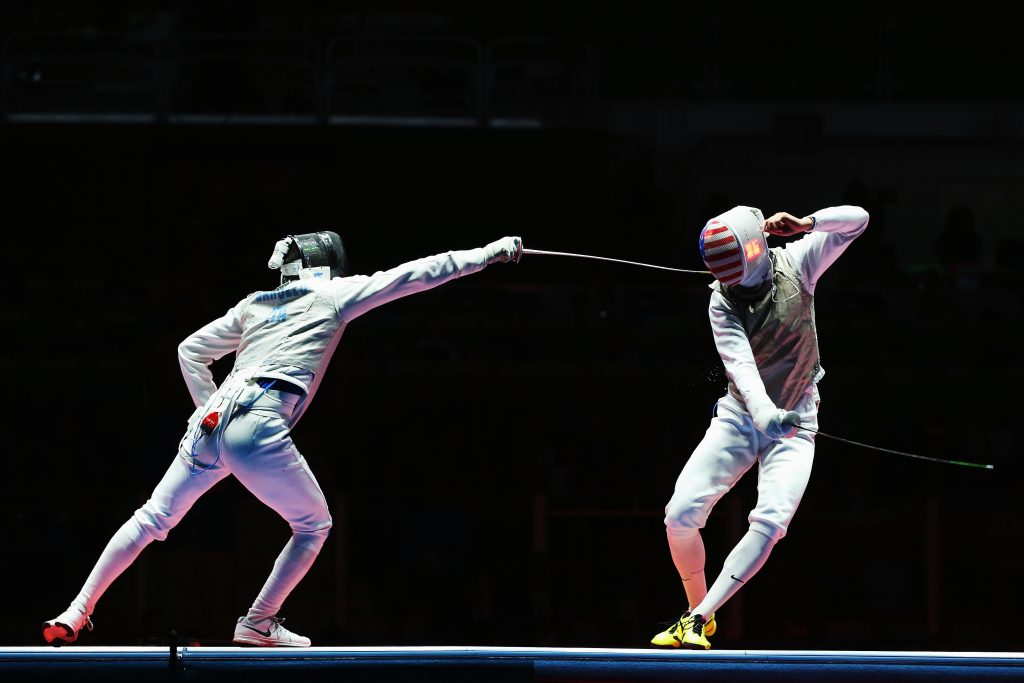 RIO DE JANEIRO, BRAZIL - AUGUST 07: Daniele Garozzo (L) of Italy competes with Alexander Massialas (R) of the United States on his way to winning the Men's Individual Foil Final on Day 2 of the Rio 2016 Olympic Games at Carioca Arena 3 on August 7, 2016 in Rio de Janeiro, Brazil. (Photo by Alex Livesey/Getty Images)