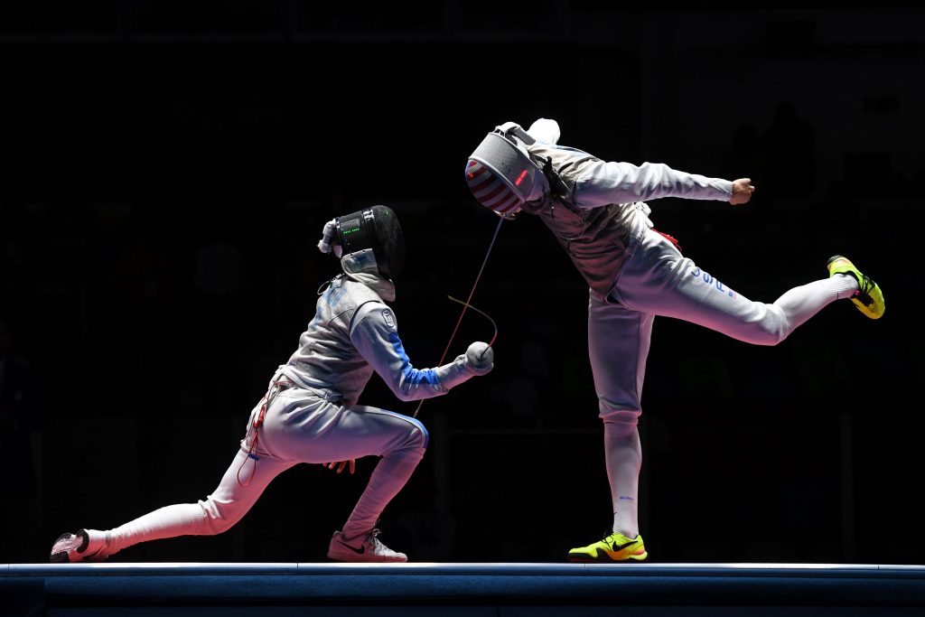 Italy's Daniele Garozzo (L) competes against US Alexander Massialas during the mens team foil bronze medal bout between Italy and US as part of the fencing event of the Rio 2016 Olympic Games, on August 12, 2016, at the Carioca Arena 3, in Rio de Janeiro. / AFP / Kirill KUDRYAVTSEV (Photo credit should read KIRILL KUDRYAVTSEV/AFP/Getty Images)