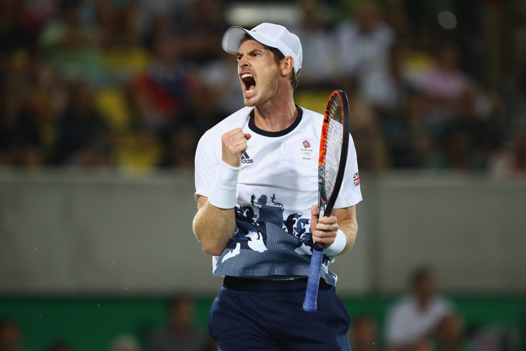 RIO DE JANEIRO, BRAZIL - AUGUST 14: Andy Murray of Great Britain celebrates winning match point during the men's singles gold medal match against Juan Martin Del Potro of Argentina on Day 9 of the Rio 2016 Olympic Games at the Olympic Tennis Centre on August 14, 2016 in Rio de Janeiro, Brazil. (Photo by Clive Brunskill/Getty Images)