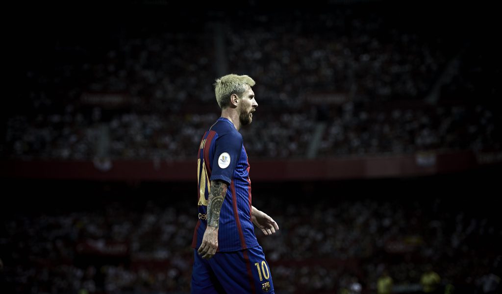 SEVILLE, SPAIN - AUGUST 14: Lionel Messi of FC Barcelona looks on during the match between Sevilla FC vs FC Barcelona as part of the Spanish Super Cup Final 1st Leg at Estadio Ramon Sanchez Pizjuan on August 14, 2016 in Seville, Spain. (Photo by Aitor Alcalde/Getty Images)