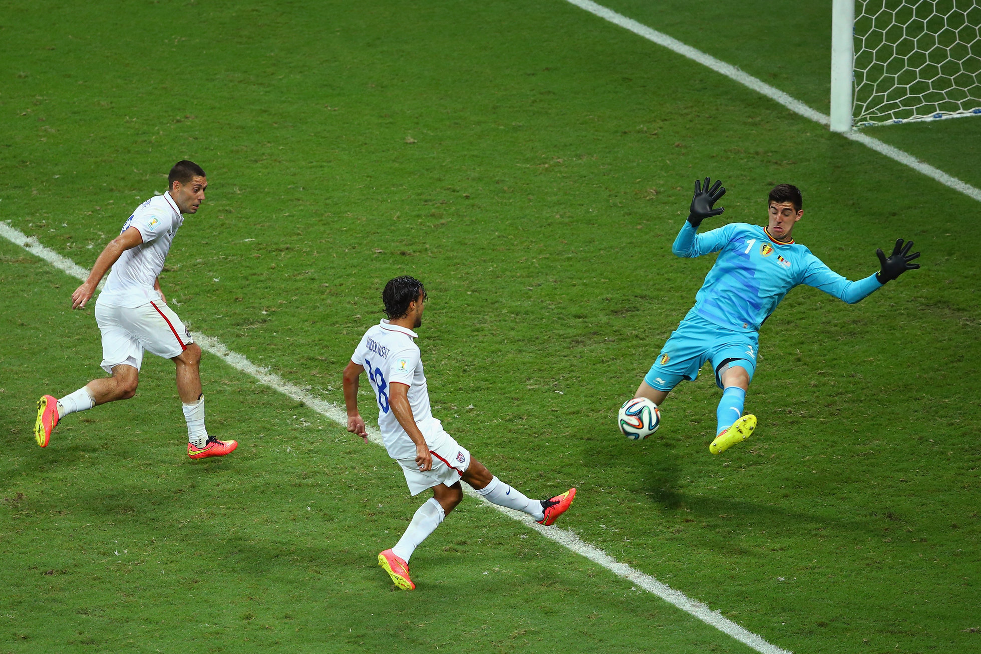 SALVADOR, BRAZIL - JULY 01: Chris Wondolowski of the United States misses a chance against Thibaut Courtois of Belgium during the 2014 FIFA World Cup Brazil Round of 16 match between Belgium and the United States at Arena Fonte Nova on July 1, 2014 in Salvador, Brazil. (Photo by Robert Cianflone/Getty Images)