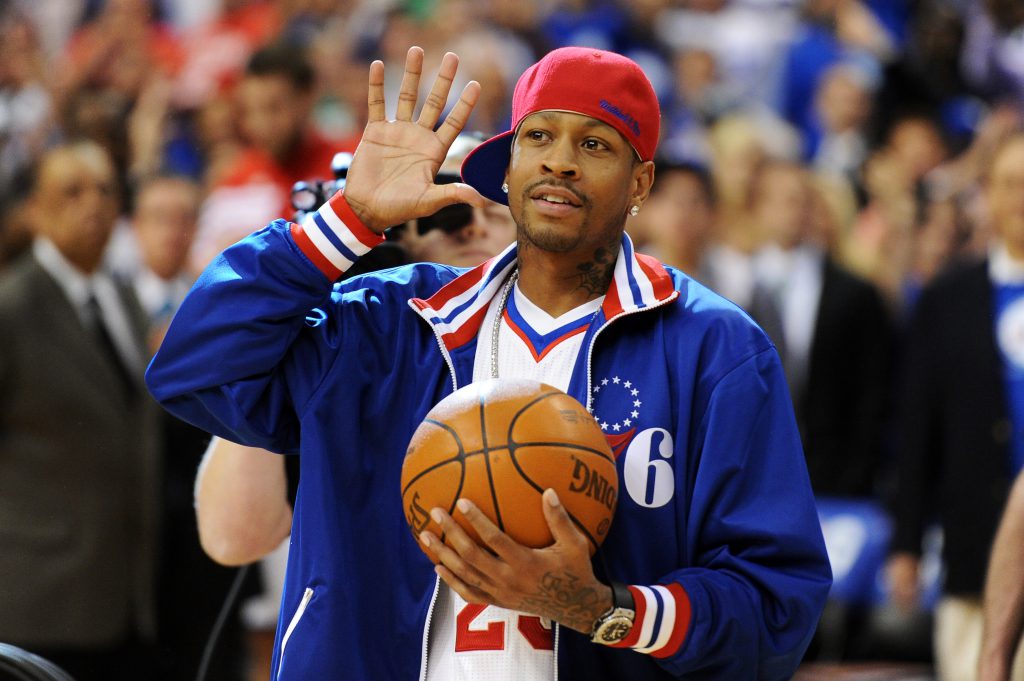 PHILADELPHIA, PA - MAY 23: Former Philadelphia 76ers player Allen Iverson walks onto the court to deliver the game ball before the game against the Boston Celtics in Game Six of the Eastern Conference Semifinals in the 2012 NBA Playoffs at the Wells Fargo Center on May 23, 2012 in Philadelphia, Pennsylvania. NOTE TO USER: User expressly acknowledges and agrees that, by downloading and or using this photograph, User is consenting to the terms and conditions of the Getty Images License Agreement. (Photo by Drew Hallowell/Getty Images)