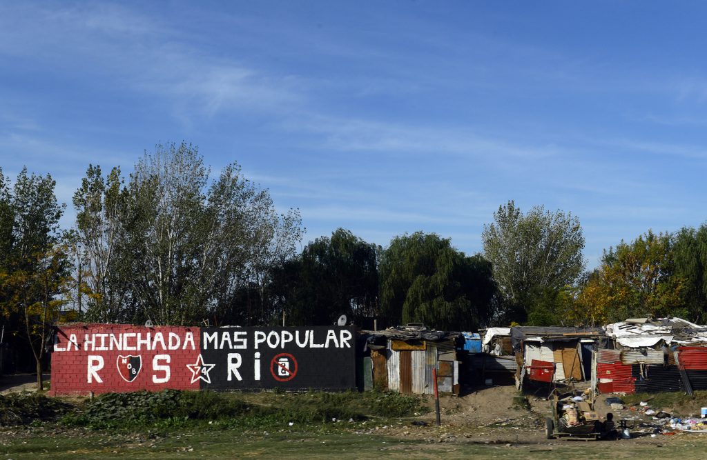 A graffiti cheering Argentine first division football club Newell's Old Boys is seen at a shantytown near the city of Rosario, Argentina on May 14, 2013. Rosario, the city where Argentine football star Lionel Messi was born, regained the sport splendor of old times while Newell's is beginning to look like the new champion of Argentine First Division championship and Rosario Central to return to the First Division tournament. AFP PHOTO / DANIEL GARCIA (Photo credit should read DANIEL GARCIA/AFP/Getty Images)