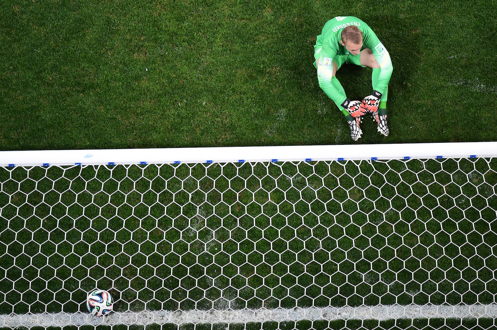 Netherlands' goalkeeper Jasper Cillessen reacts after failing to make a save during a penalty shoot-out of the semi-final football match between Netherlands and Argentina of the FIFA World Cup at The Corinthians Arena in Sao Paulo on July 9, 2014. AFP PHOTO / FRANCOIS XAVIER MARIT